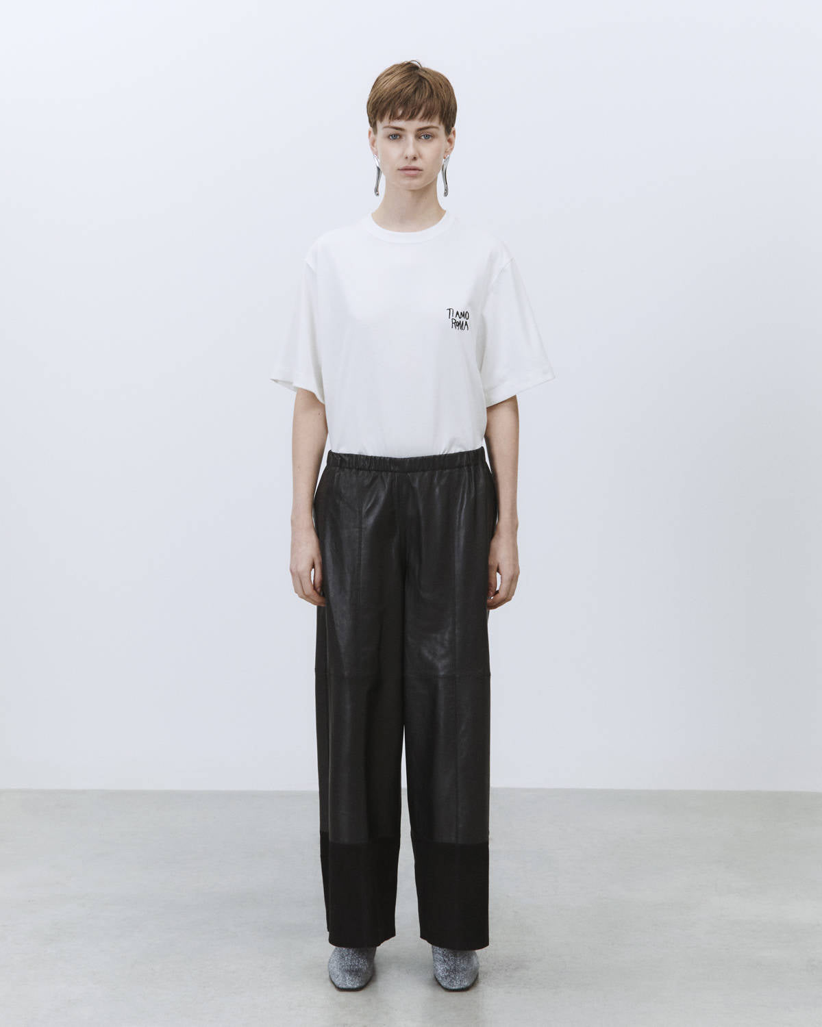 LEATHER AND SUEDE TROUSERS