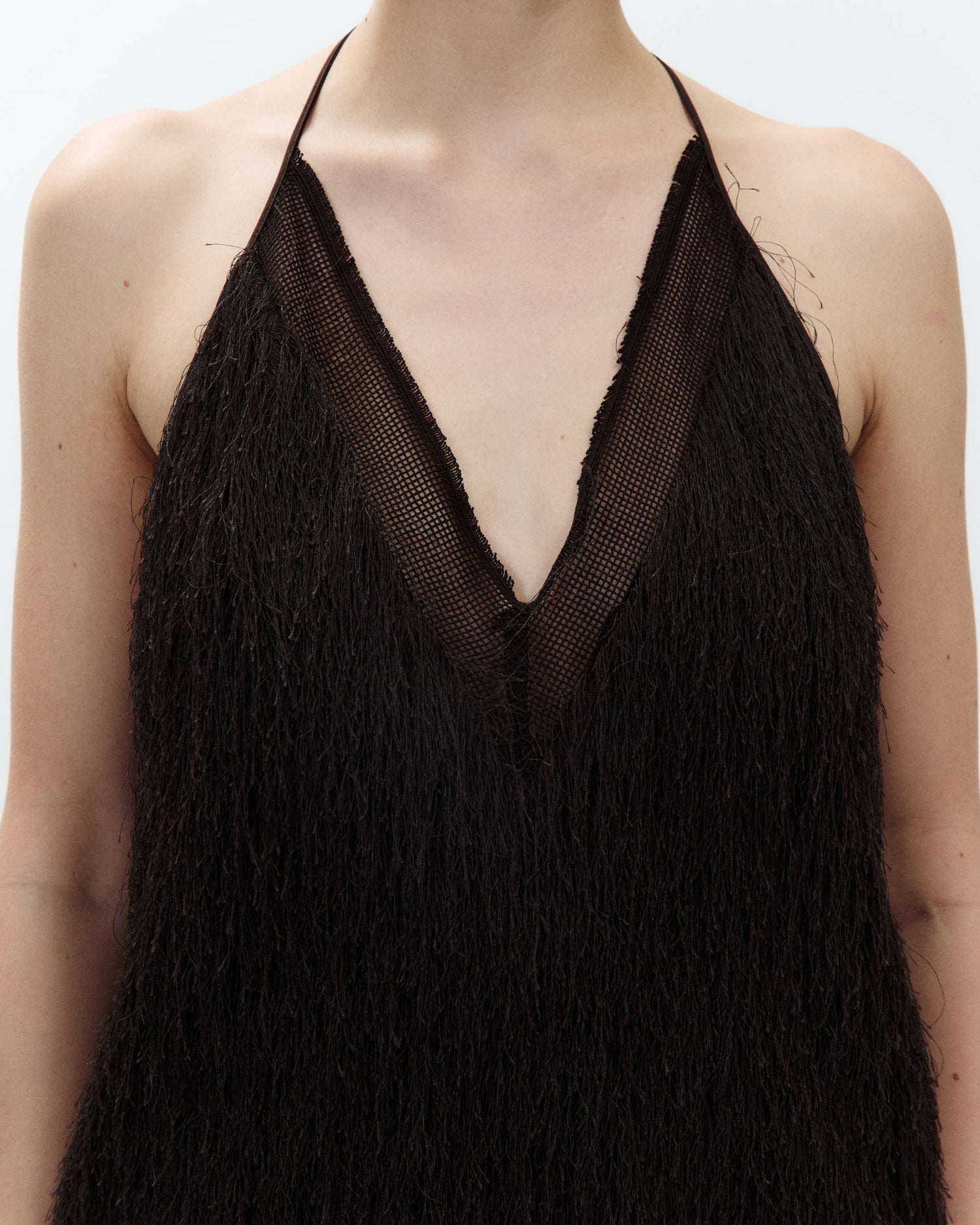 TOP CON FRANGE E PIZZO