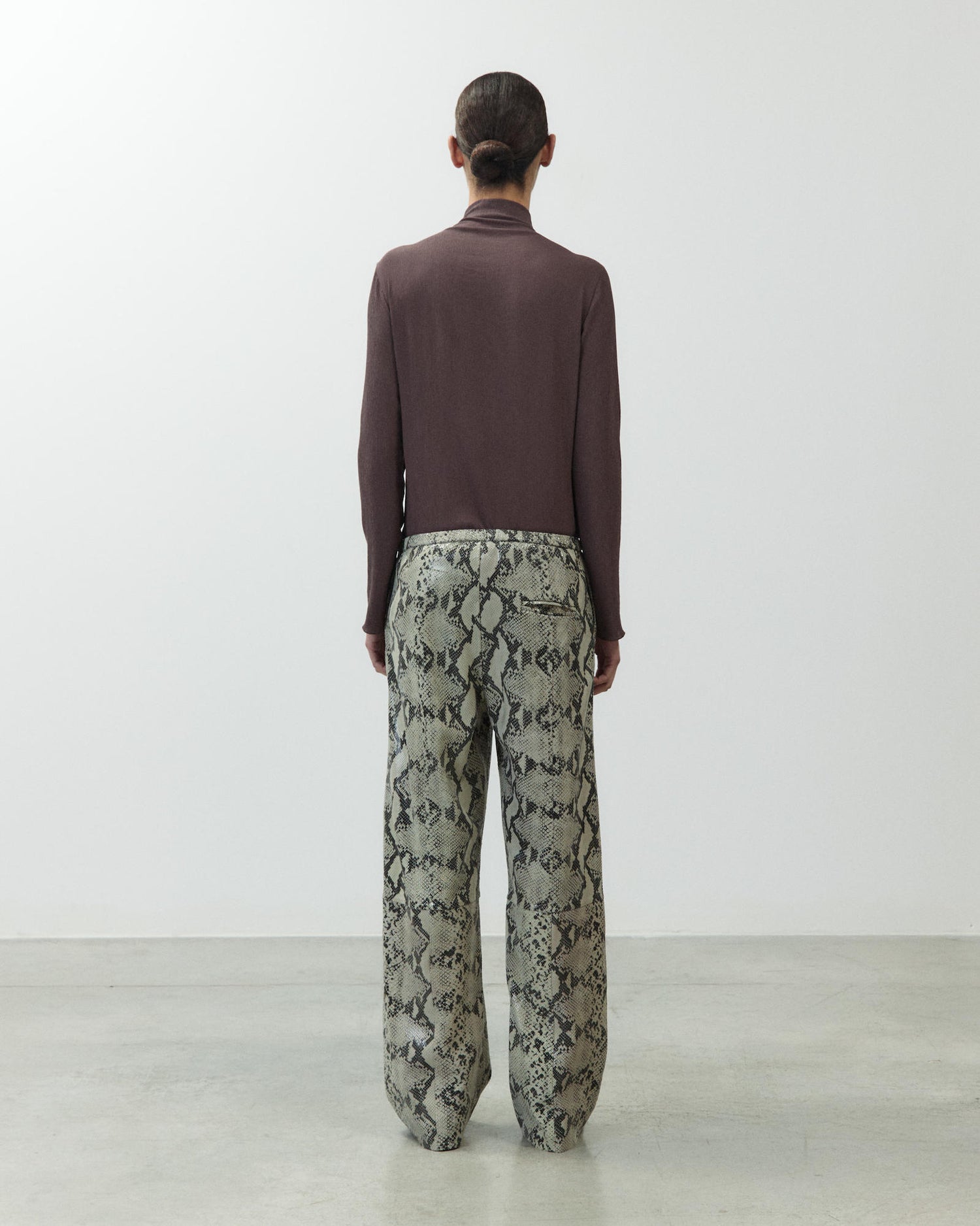 PYTHON PRINT LEATHER TROUSERS