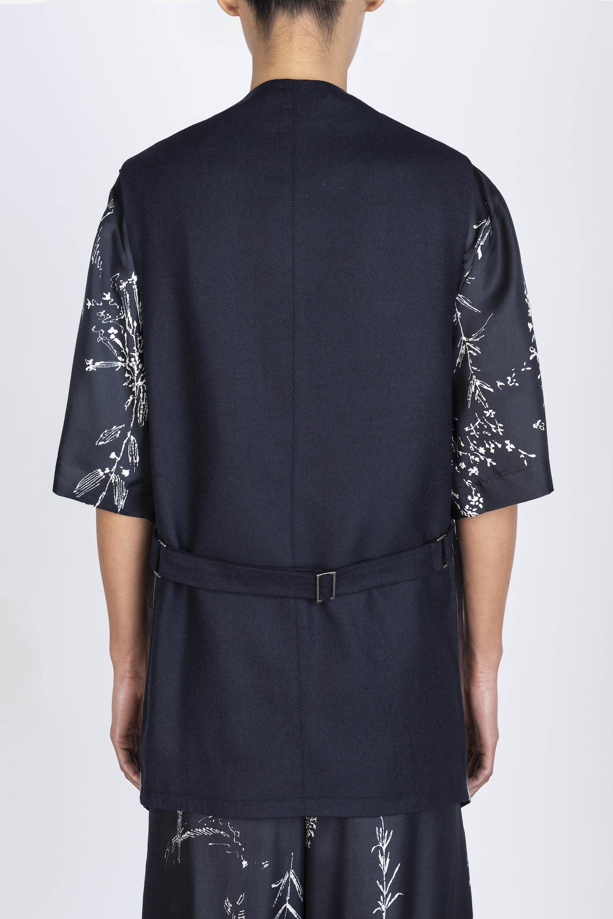 GILET LUNGO IN PELLE VERNICIATA