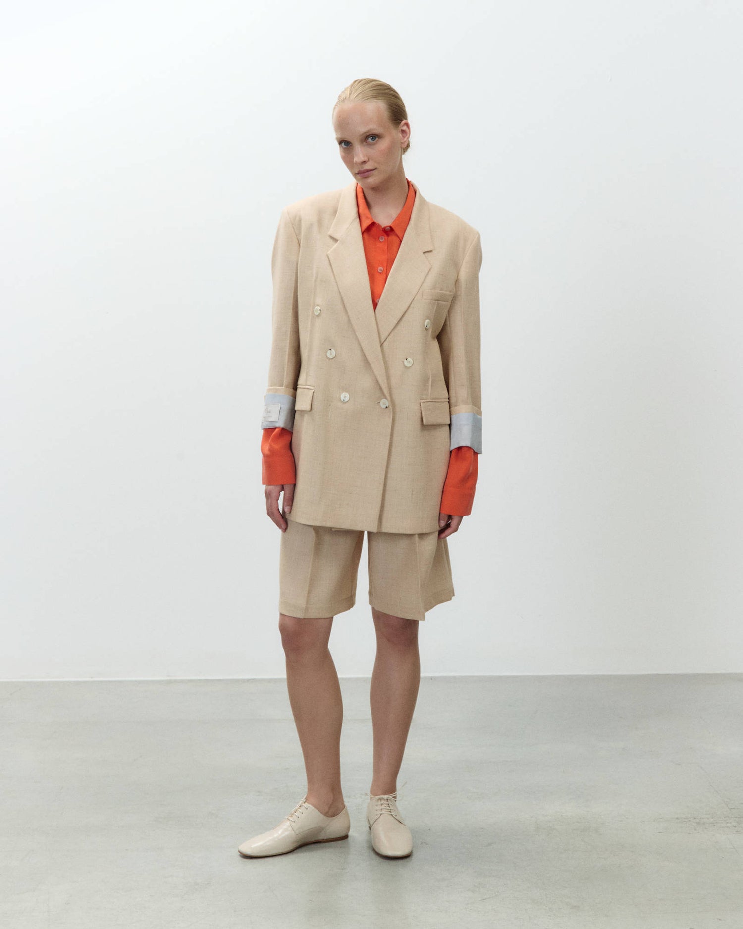 DOUBLE-BREASTED GRISAILLE WOOL BLAZER