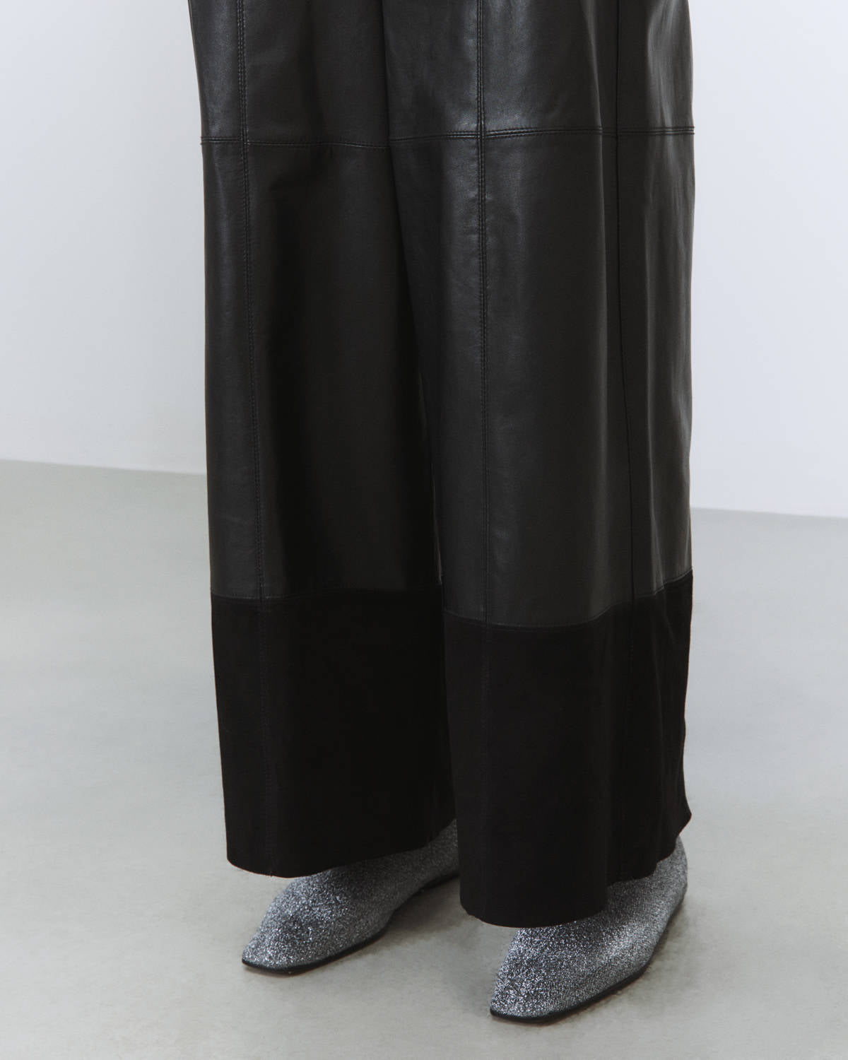 LEATHER AND SUEDE TROUSERS