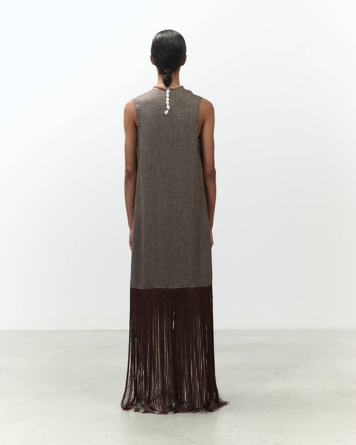 LONG VEST WITH FRINGES