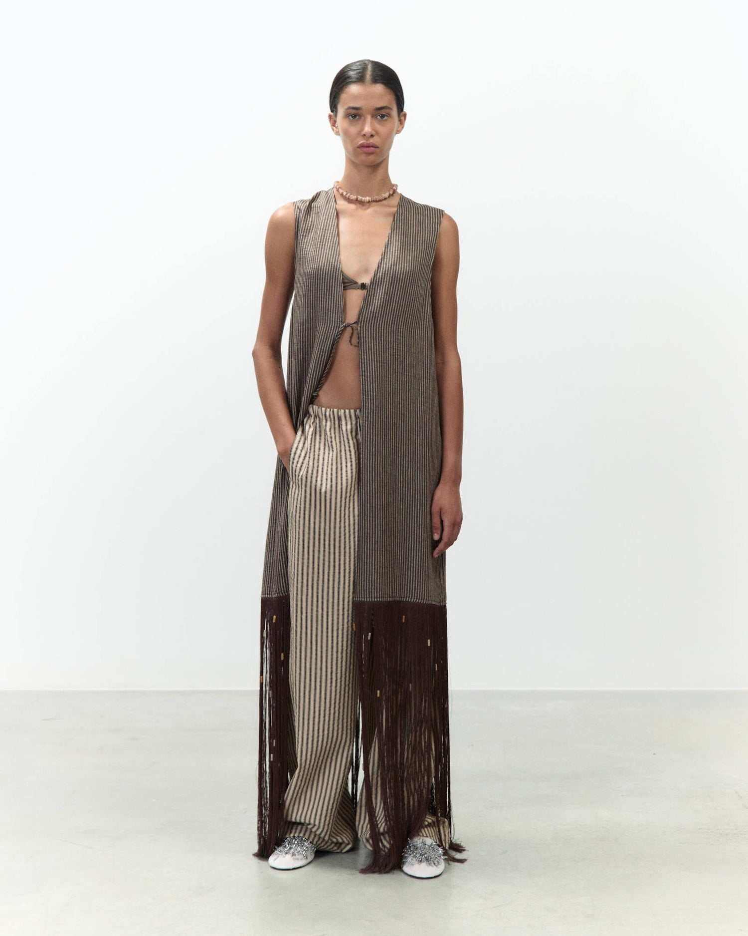 LONG VEST WITH FRINGES
