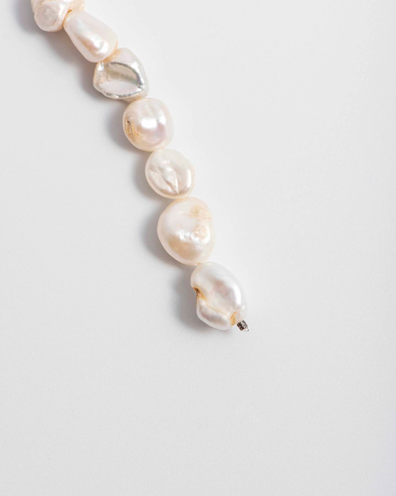 PAIR OF IRREGULAR PEARL EARRINGS