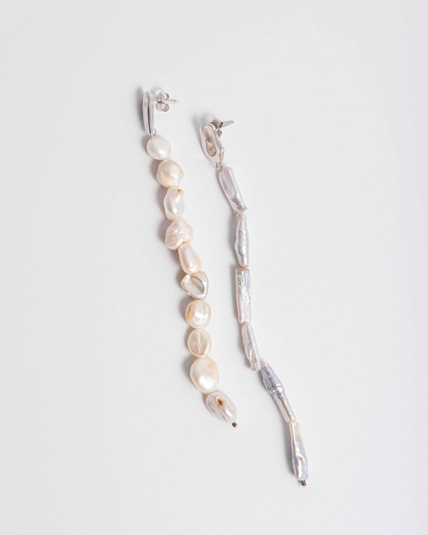 PAIR OF IRREGULAR PEARL EARRINGS