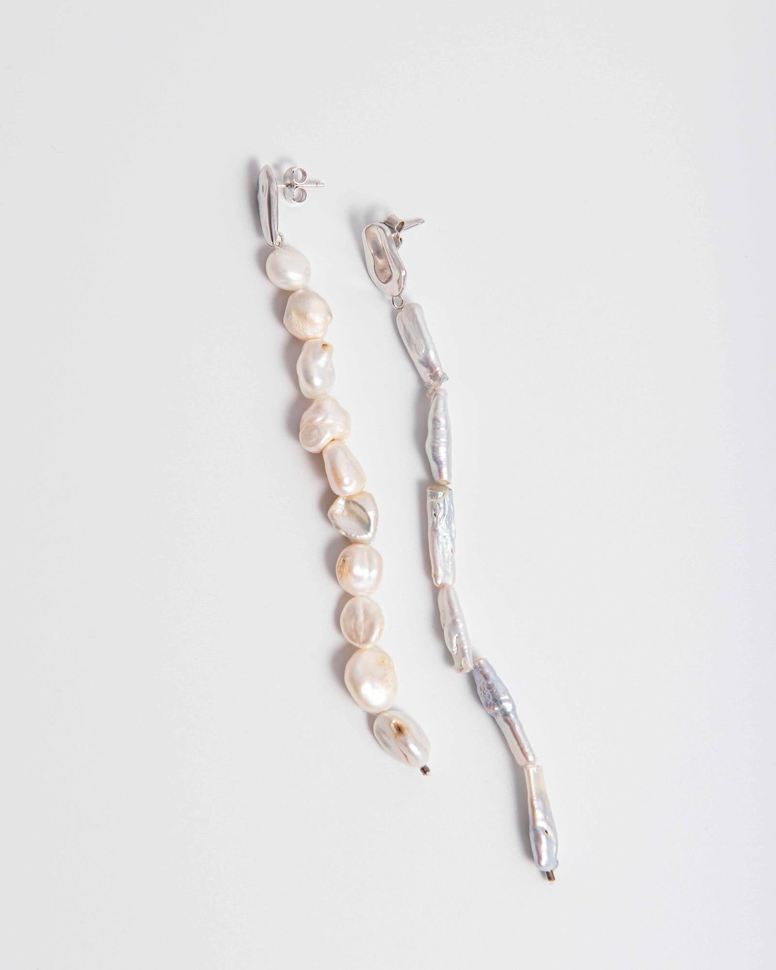 PAIR OF IRREGULAR PEARL EARRINGS