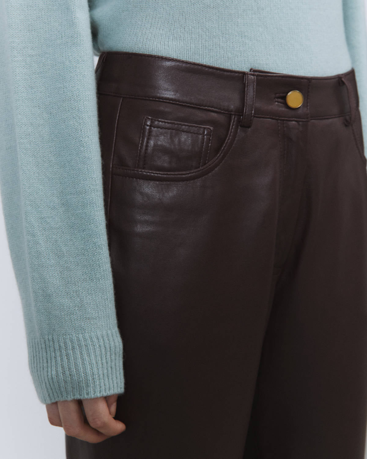 FIVE LEATHER POCKETS