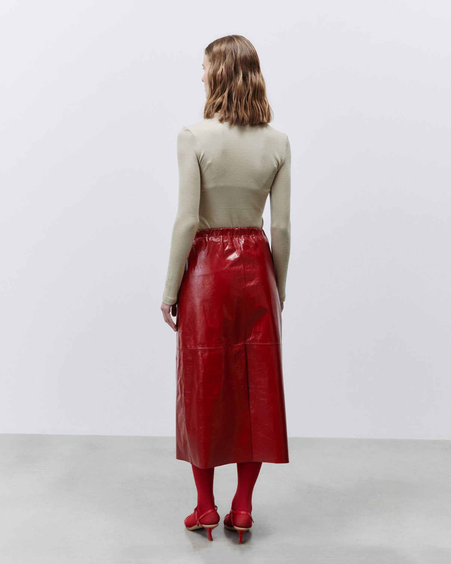 PATENT LEATHER MIDI SKIRT