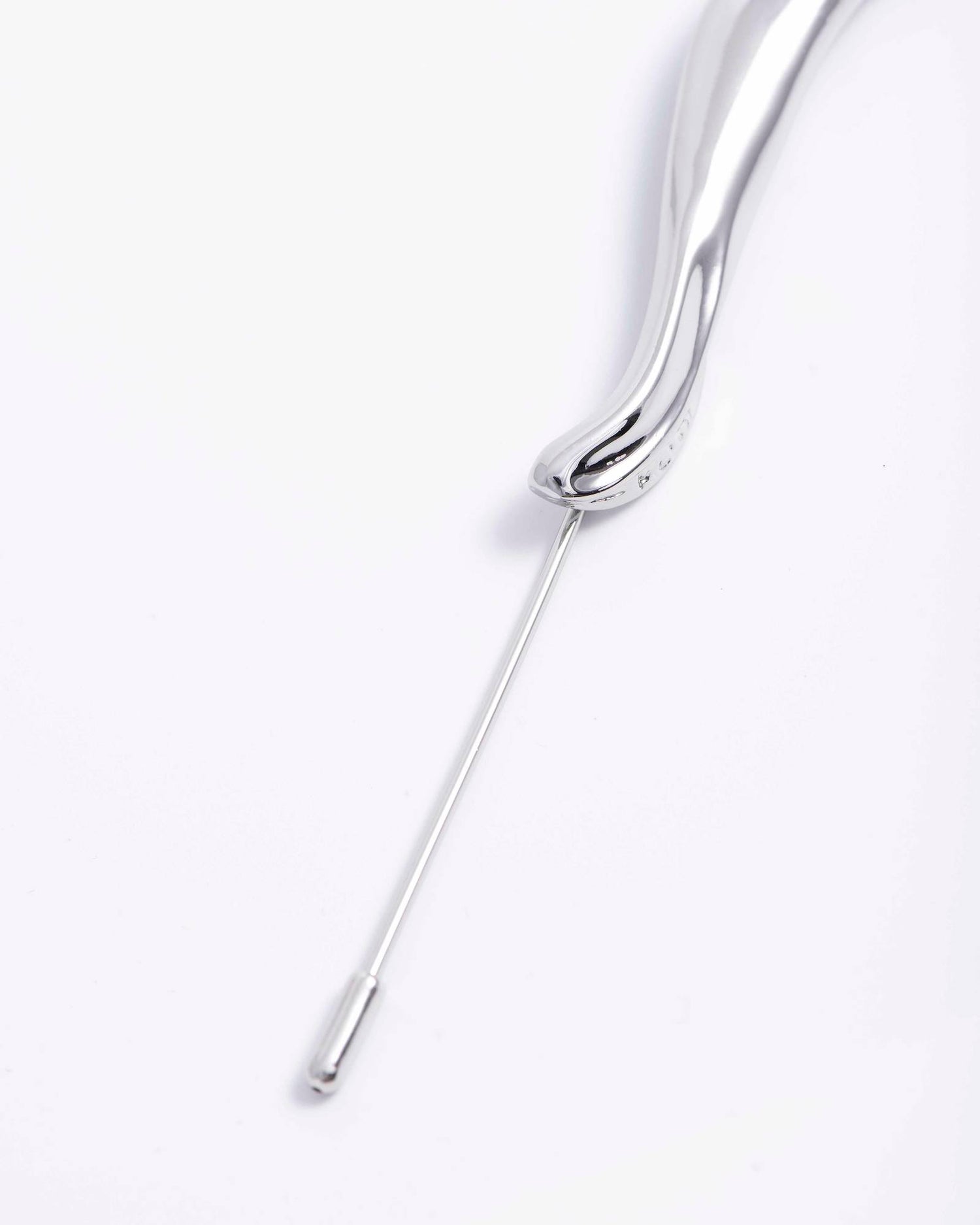 PIN WITH IRREGULAR ELEMENT