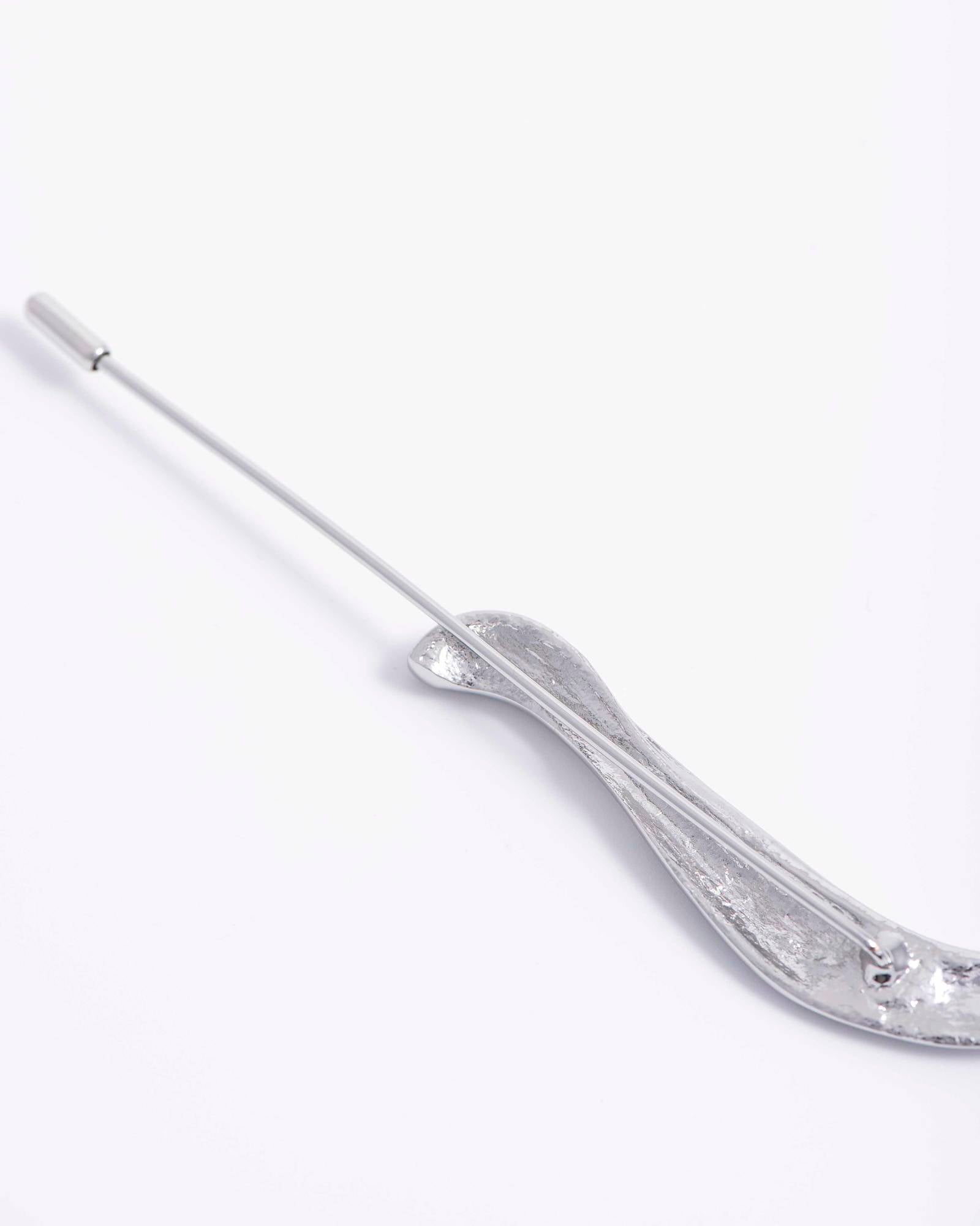 PIN WITH IRREGULAR ELEMENT