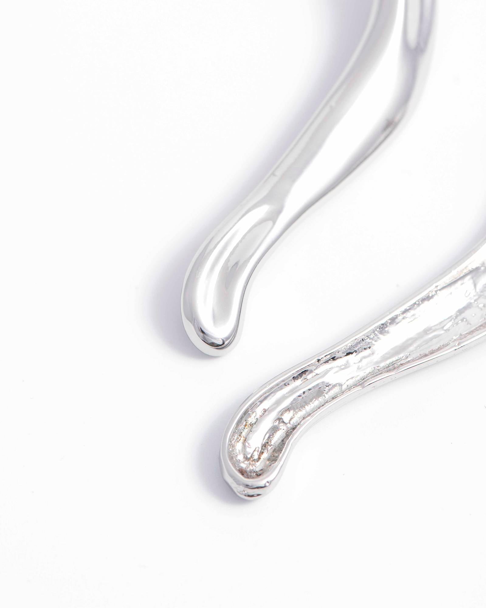 PAIR OF IRREGULAR EARRINGS
